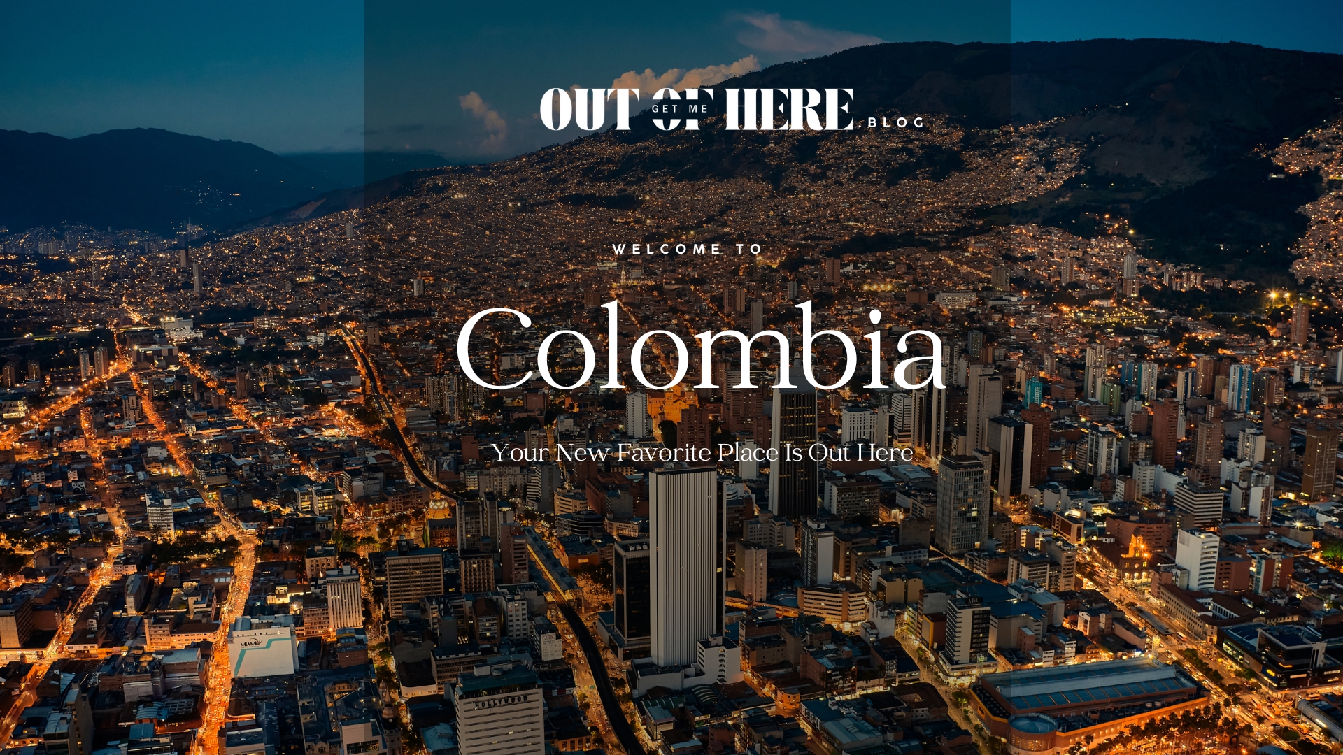 Colombia city view at night with busy streets and buildings